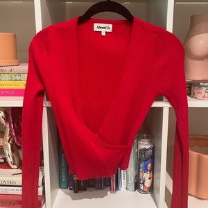 About us wrap/cross front red long sleeve going out top